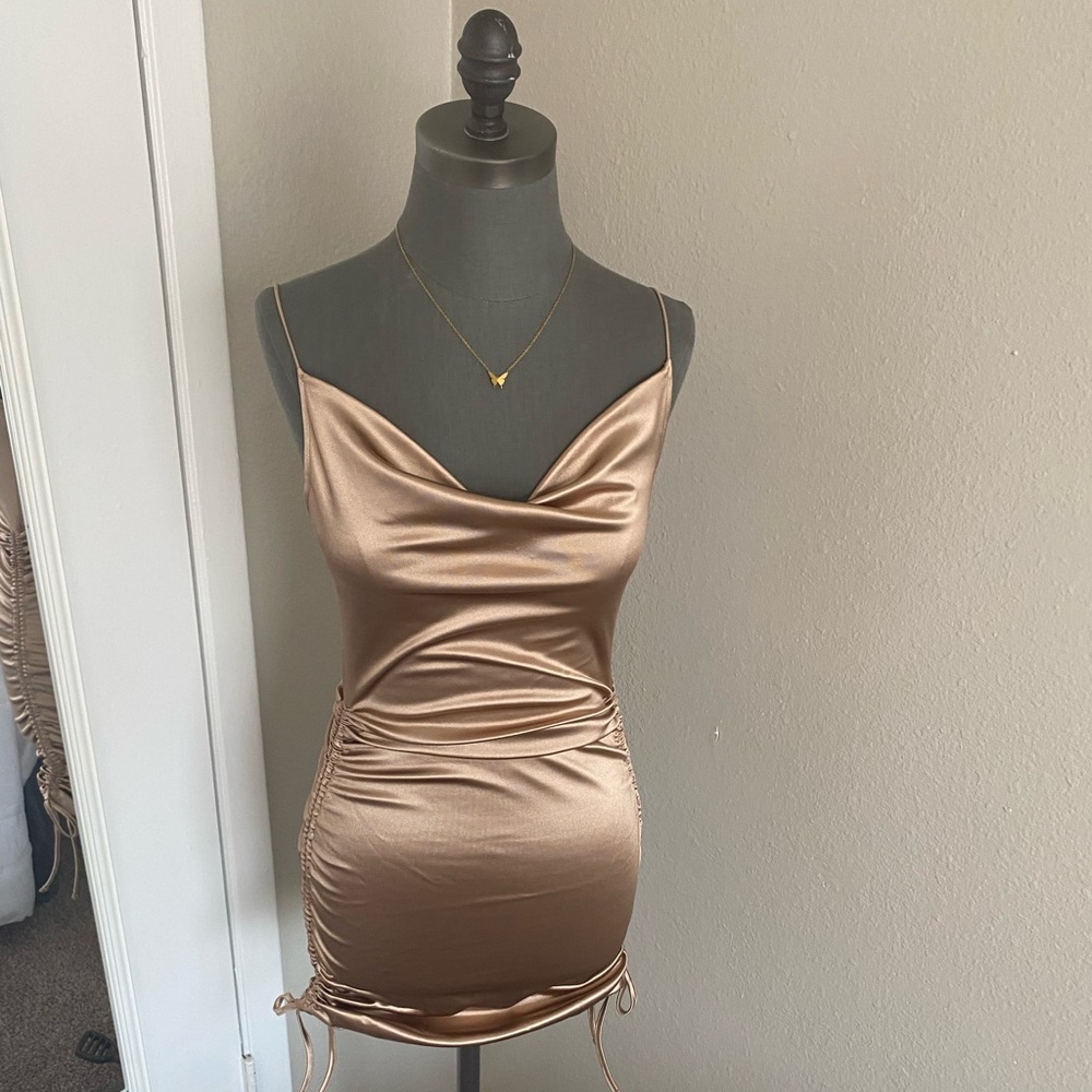 Rose gold bodycon dress with side drawstrings